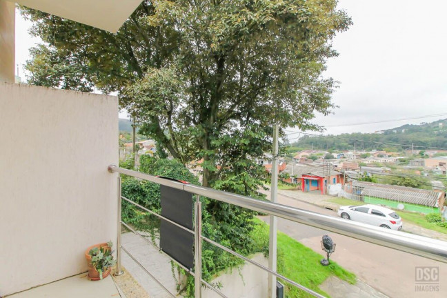 Imagem Casa com 2 Quartos à Venda, 87 m² em Campo Novo - Porto Alegre
