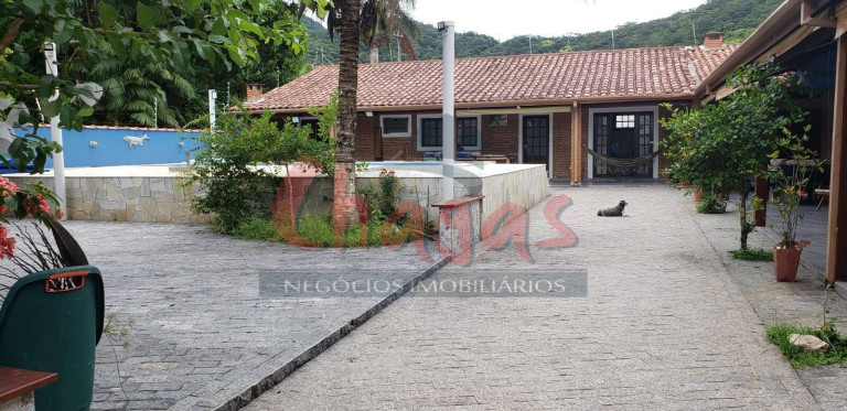 Imagem Casa com 5 Quartos para Alugar, 345 m² em Massaguaçu - Caraguatatuba