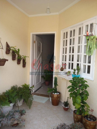 Imagem Casa de Condomínio com 2 Quartos à Venda, 86 m² em Martim De Sá - Caraguatatuba