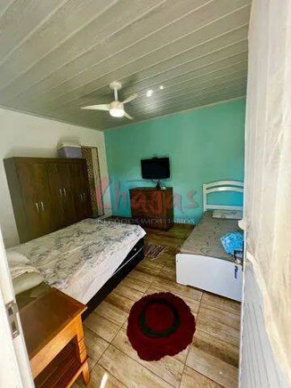 Imagem Sobrado com 5 Quartos à Venda, 180 m² em Porto Novo - Caraguatatuba