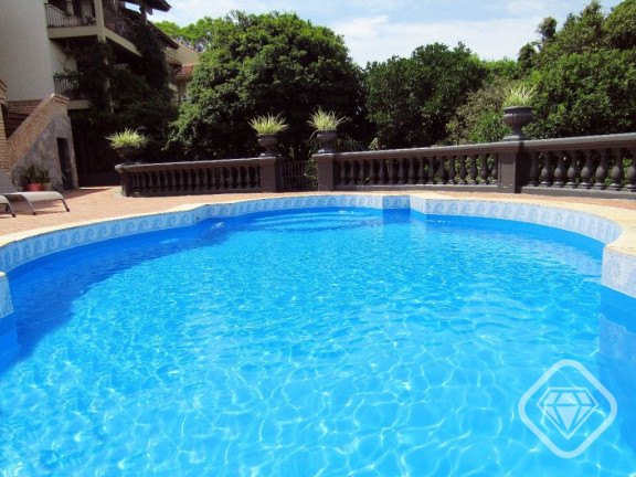 Imagem Casa de Condomínio com 4 Quartos à Venda, 550 m² em Cavalhada - Porto Alegre