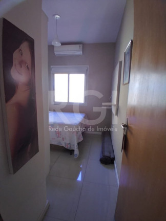 Imagem Casa de Condomínio com 3 Quartos à Venda, 136 m² em Hípica - Porto Alegre