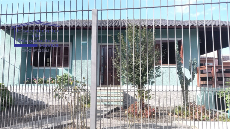 Imagem Casa com 4 Quartos à Venda,  em Vila Nova - Porto Alegre