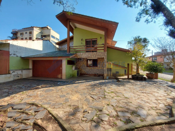 Imagem Sobrado com 5 Quartos à Venda, 380 m² em Jardim Lindóia - Porto Alegre