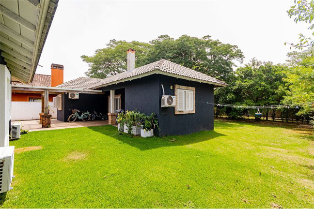 Imagem Casa com 4 Quartos à Venda, 295 m² em Belém Novo - Porto Alegre