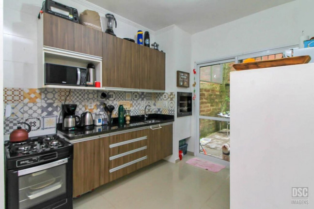Imagem Casa com 2 Quartos à Venda, 87 m² em Campo Novo - Porto Alegre
