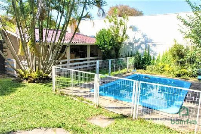 Imagem Casa com 4 Quartos à Venda, 301 m² em Ipanema - Porto Alegre