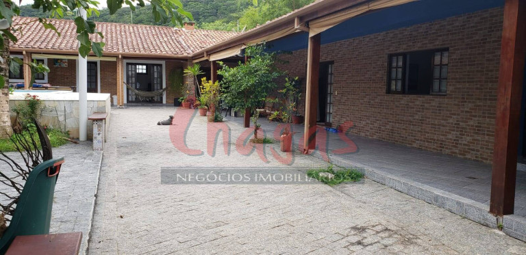 Imagem Casa com 5 Quartos para Alugar, 345 m² em Massaguaçu - Caraguatatuba