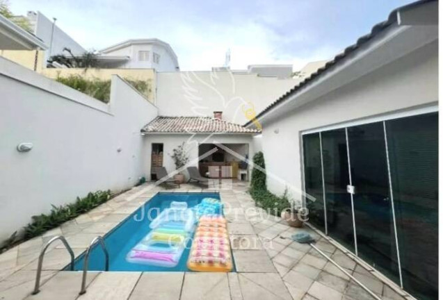 Imagem Casa de Condomínio com 4 Quartos à Venda, 424 m² em Alphaville - Santana De Parnaíba