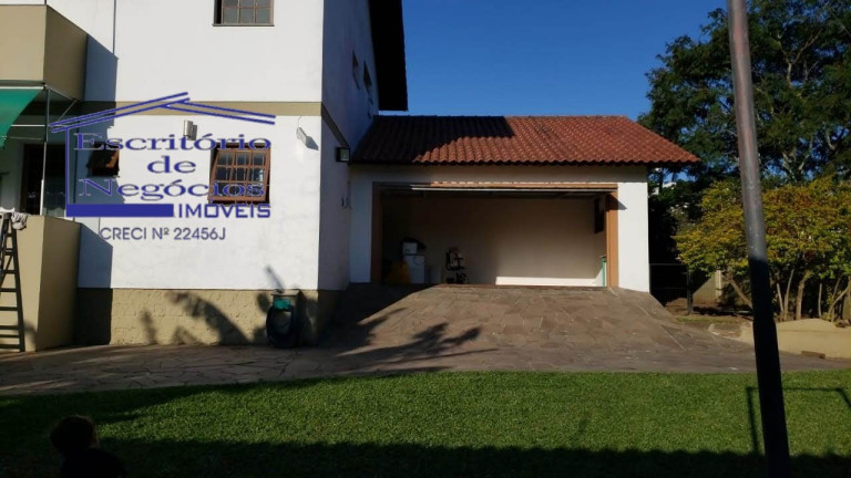 Imagem Casa com 4 Quartos à Venda, 268 m² em Cavalhada - Porto Alegre