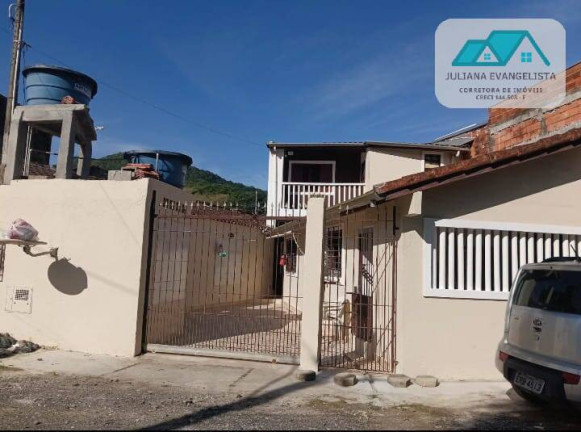Imagem Casa com 3 Quartos à Venda, 129 m² em Jardim Casa Branca - Caraguatatuba