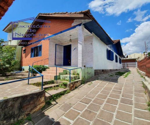 Imagem Casa com 4 Quartos à Venda,  em Cavalhada - Porto Alegre