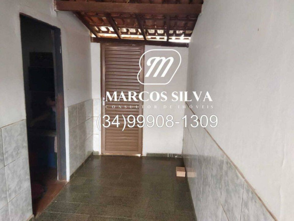 Imagem Casa com 3 Quartos à Venda, 300 m² em Segismundo Pereira - Uberlândia