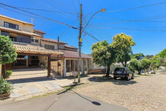 Imagem Casa com 3 Quartos à Venda,  em Cavalhada - Porto Alegre
