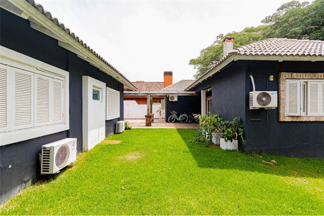 Imagem Casa com 4 Quartos à Venda, 295 m² em Belém Novo - Porto Alegre