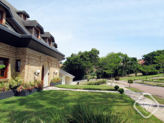 Imagem Casa de Condomínio com 4 Quartos à Venda, 550 m² em Cavalhada - Porto Alegre