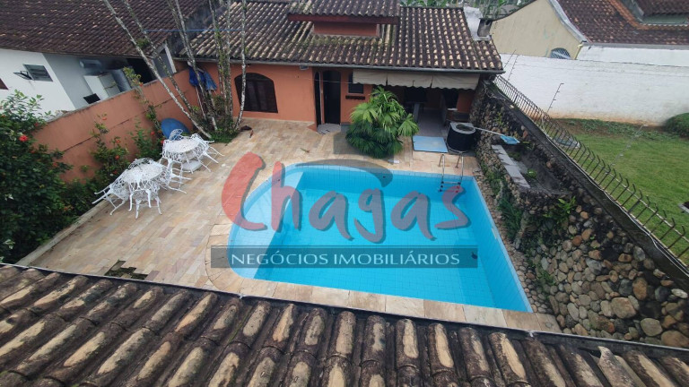 Imagem Casa com 4 Quartos à Venda, 460 m² em Caraguatatuba